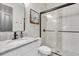 Beautiful bathroom featuring a granite countertop, modern vanity, and a sleek glass-enclosed shower at 3477 Barbour Trl, Odessa, FL 33556