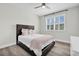 Bedroom with neutral walls, a ceiling fan and a window with plantation shutters at 3477 Barbour Trl, Odessa, FL 33556