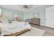 Light and airy main bedroom with ceiling fan, neutral tones, and plenty of natural light at 3477 Barbour Trl, Odessa, FL 33556
