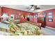 Large bedroom featuring a queen bed and built in dresser with mirrorred doors at 3898 49Th S Ave, St Petersburg, FL 33711