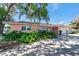 Charming single-story home featuring a well-maintained lawn and landscaping at 3898 49Th S Ave, St Petersburg, FL 33711