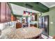 Updated kitchen with granite countertops, stainless steel appliances and ample storage at 3898 49Th S Ave, St Petersburg, FL 33711