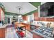 Featuring granite counters, stainless appliances, and a kitchen island, this kitchen is both practical and attractive at 3898 49Th S Ave, St Petersburg, FL 33711