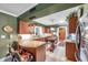 Well-equipped kitchen with granite countertops, custom cabinets, and modern appliances offers a functional design at 3898 49Th S Ave, St Petersburg, FL 33711