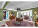 Open-concept living room with formal dining, lots of natural light and an adjacent kitchen at 3898 49Th S Ave, St Petersburg, FL 33711