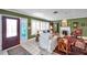 Cozy living room with fireplace, large windows with shutters, and elegant decor at 3898 49Th S Ave, St Petersburg, FL 33711