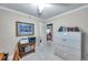 Neutral office space featuring a filing cabinet and a peek into the next room at 3898 49Th S Ave, St Petersburg, FL 33711