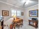 Charming office space with a desk, shelving and bright window at 3898 49Th S Ave, St Petersburg, FL 33711