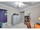 Office featuring neutral walls, a door, and a bookcase with books at 3898 49Th S Ave, St Petersburg, FL 33711
