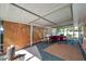 Relaxing screened-in patio with comfortable seating and stylish decor at 3898 49Th S Ave, St Petersburg, FL 33711