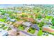 Aerial view of home featuring an enclosed pool and spacious yard at 3928 E Eden Roc Cir, Tampa, FL 33634