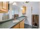 Bathroom featuring single sink, vanity and tiled shower at 3928 E Eden Roc Cir, Tampa, FL 33634