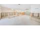Expansive living area with lots of open space and natural light from the windows and doors at 3928 E Eden Roc Cir, Tampa, FL 33634