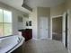 Bathroom features a soaking tub, vanity with stone countertop, and tile flooring at 405 Islebay Dr, Apollo Beach, FL 33572