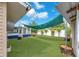 This backyard offers artificial turf and privacy fencing at 4731 W Leila Ave, Tampa, FL 33616