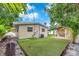 This backyard offers artificial turf and a gazebo at 4731 W Leila Ave, Tampa, FL 33616
