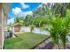 This backyard offers artificial turf and a gazebo at 4731 W Leila Ave, Tampa, FL 33616