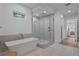 Beautiful bathroom featuring a free-standing tub and a glass-enclosed shower at 503 W Davis Blvd, Tampa, FL 33606