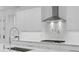 Modern kitchen featuring stainless steel appliances, a spacious countertop, and sleek cabinetry at 503 W Davis Blvd, Tampa, FL 33606