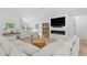 Bright living room features a fireplace, a comfortable sectional, and stylish finishes at 503 W Davis Blvd, Tampa, FL 33606
