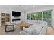 Bright living room with a fireplace and access to the backyard at 503 W Davis Blvd, Tampa, FL 33606