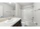Bathroom features a shower/tub combo and a vanity with storage at 5110 Sylvester Loop, Tampa, FL 33610