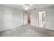 Spacious bedroom features neutral walls, carpeted floors and a ceiling fan at 5110 Sylvester Loop, Tampa, FL 33610