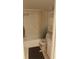 Bathroom with a toilet, shower and tub combination, and wall cabinet at 5541 Bay Blvd # 204, Port Richey, FL 34668