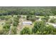 Sprawling property with a long home, an above ground pool and several out buildings at 5613 Forest Creek Rd, Lakeland, FL 33810