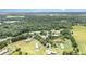 Community nestled among large trees and a lake in a tranquil, lush setting at 5613 Forest Creek Rd, Lakeland, FL 33810