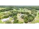 Secluded property featuring lush surroundings, a stocked pond and above ground pool at 5613 Forest Creek Rd, Lakeland, FL 33810