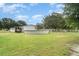 Large backyard with above ground pool and fenced yard at 5613 Forest Creek Rd, Lakeland, FL 33810