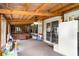 Enclosed sunroom with hot tub, ceiling fan and easy access to the outside at 5613 Forest Creek Rd, Lakeland, FL 33810