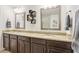 Spacious bathroom with double sinks, granite countertops, and a contemporary design at 5808 Grand Sonata Ave, Lutz, FL 33558