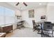 Functional home office with natural light, modern computer, and printer setup at 5808 Grand Sonata Ave, Lutz, FL 33558