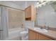 Bathroom features decorative accents, a vanity with storage, and a shower-tub combination at 6044 Sandhill Ridge Dr, Lithia, FL 33547