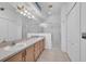 Bathroom features dual sinks, a vanity with ample storage, and a combination tub and shower at 6044 Sandhill Ridge Dr, Lithia, FL 33547