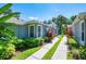 Inviting single-story villas with well-maintained landscaping and defined walkways for enhanced curb appeal at 6044 Sandhill Ridge Dr, Lithia, FL 33547