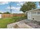 Expansive backyard with patio, lush lawn, and privacy fence at 6167 31St Ave, St Petersburg, FL 33710