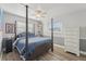 Bedroom featuring a four-poster bed and wood floors at 6167 31St Ave, St Petersburg, FL 33710