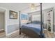 Bedroom with four poster bed and hardwood floor at 6167 31St Ave, St Petersburg, FL 33710