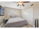 Cozy bedroom featuring a ceiling fan, closet, and natural light at 6167 31St Ave, St Petersburg, FL 33710