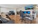 Open-concept living space connecting living room to office and kitchen, perfect for modern living at 6167 31St Ave, St Petersburg, FL 33710
