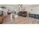 Bright living room featuring wood floors, neutral paint, and a seamless open floorplan at 6167 31St Ave, St Petersburg, FL 33710