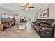 Open-concept living room featuring wood floors, neutral paint, and plenty of space to relax at 6167 31St Ave, St Petersburg, FL 33710