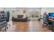 Bright and spacious living room with hardwood floors, ample natural light, and comfortable seating at 6167 31St Ave, St Petersburg, FL 33710