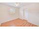 Neutral bedroom with ceiling fan, closet and light wood floors at 6237 50Th N Ave, St Petersburg, FL 33709