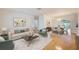 Bright and airy living room featuring hardwood floors and an open floor plan at 6237 50Th N Ave, St Petersburg, FL 33709