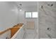 Partially renovated bathroom featuring white vanity and tiled shower at 6334 Cocoa Ln, Apollo Beach, FL 33572
