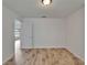 Bedroom with wood-look floors and natural light at 6334 Cocoa Ln, Apollo Beach, FL 33572